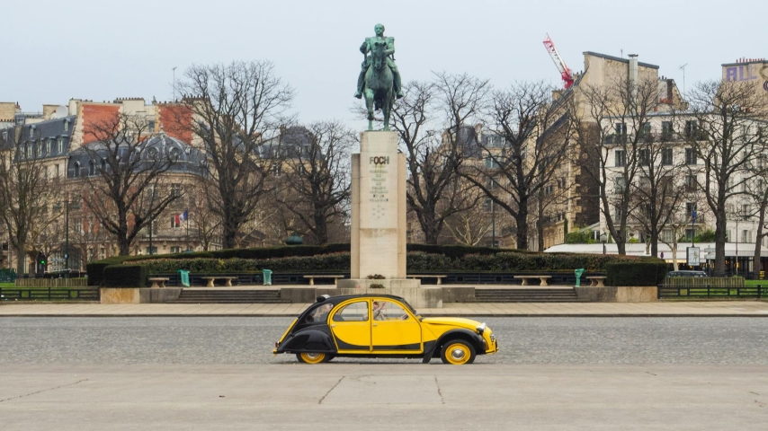 Classic Black and Yellow Citroen 2CV in Front of the Statue of Ferdinand Foch in Paris: https://www.pexels.com/photo/classic-black-and-yellow-citroen-2cv-in-front-of-the-statue-of-ferdinand-foch-in-paris-8243128/