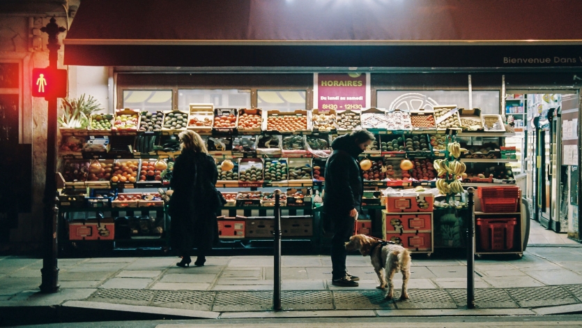 Night life, Paris, France https://unsplash.com/photos/man-in-black-jacket-standing-in-front-of-food-stall-ISPiuu_g6s8